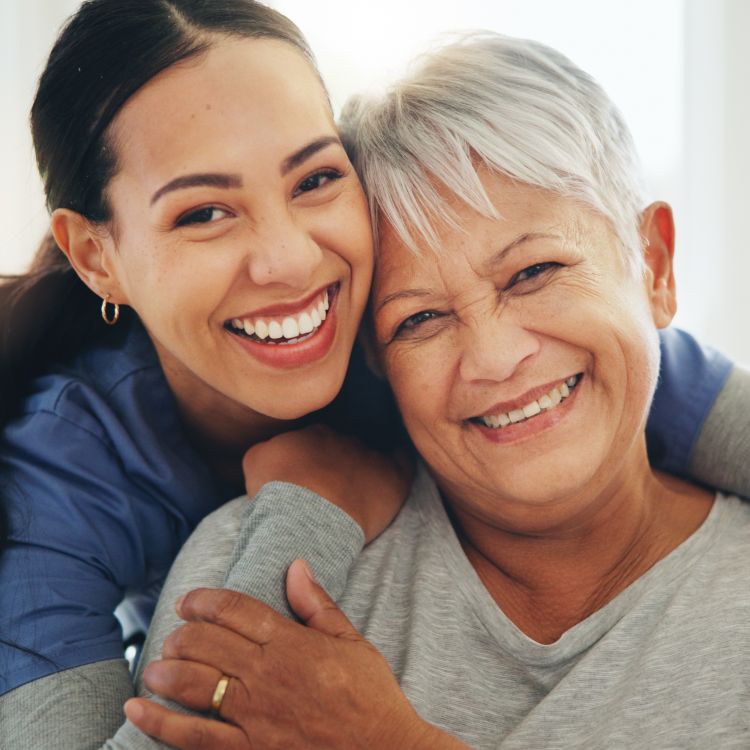 Caregiver Senior Photo_adcampaign2025-resized Collection of QUANTUM products including desktop interface, mobile app, tablet app, door control, nurse call transmitters, and wander management wearable