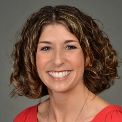 Mauri Headshot of a woman smiling
